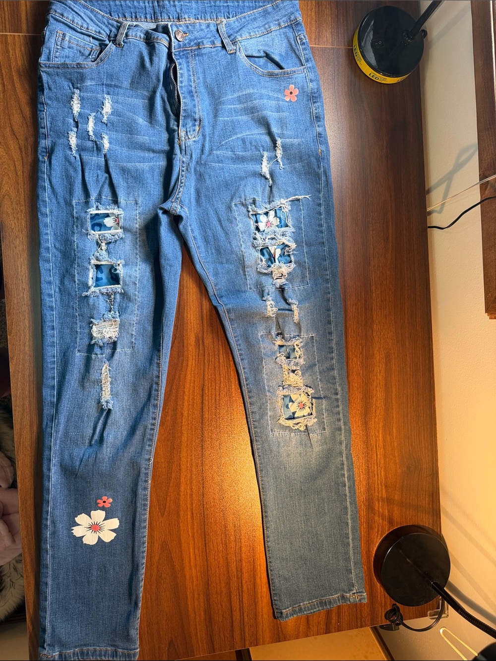 Blue stretchy straight leg Jeans with Floral Patch Distressing